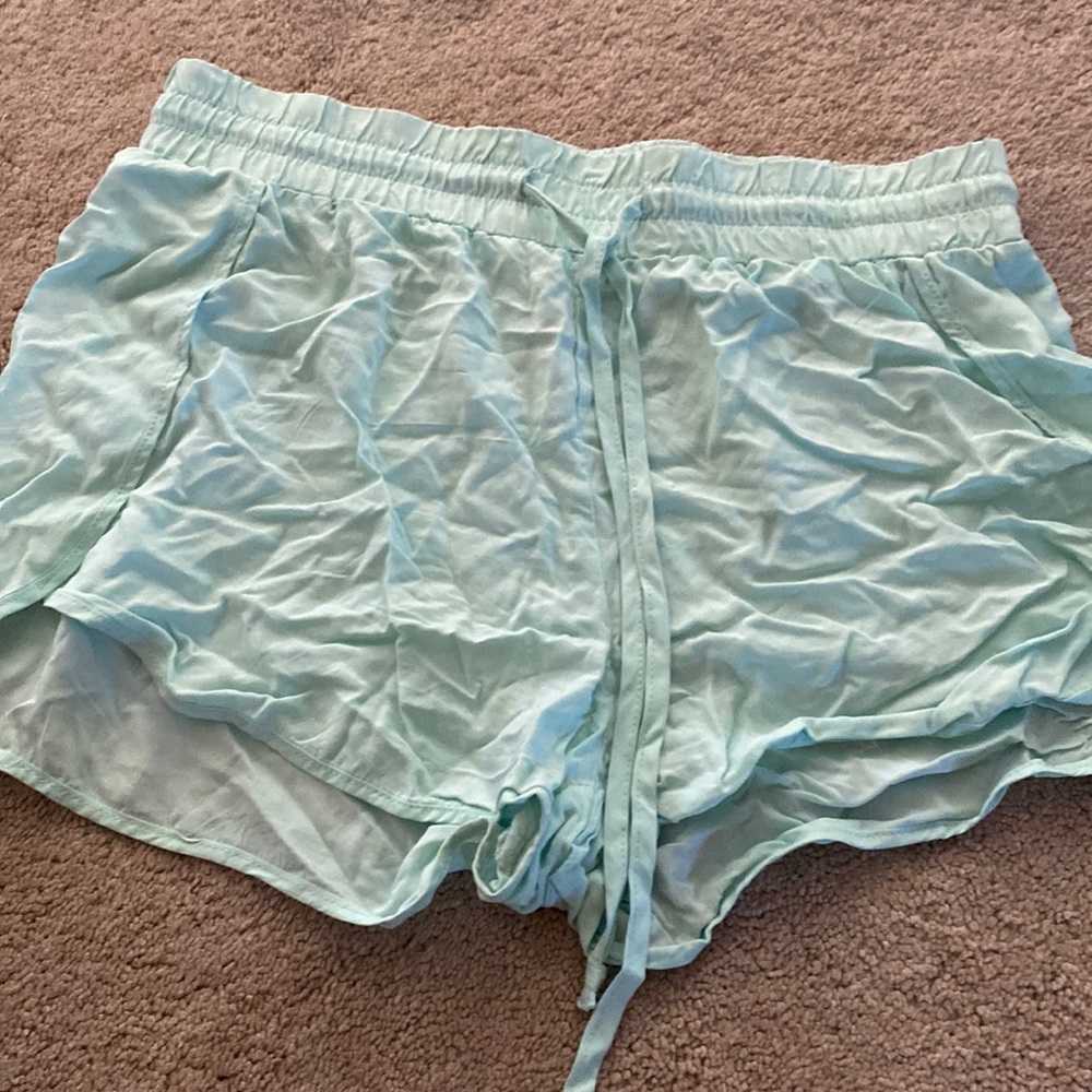 Garage - Dolphin hem shorts